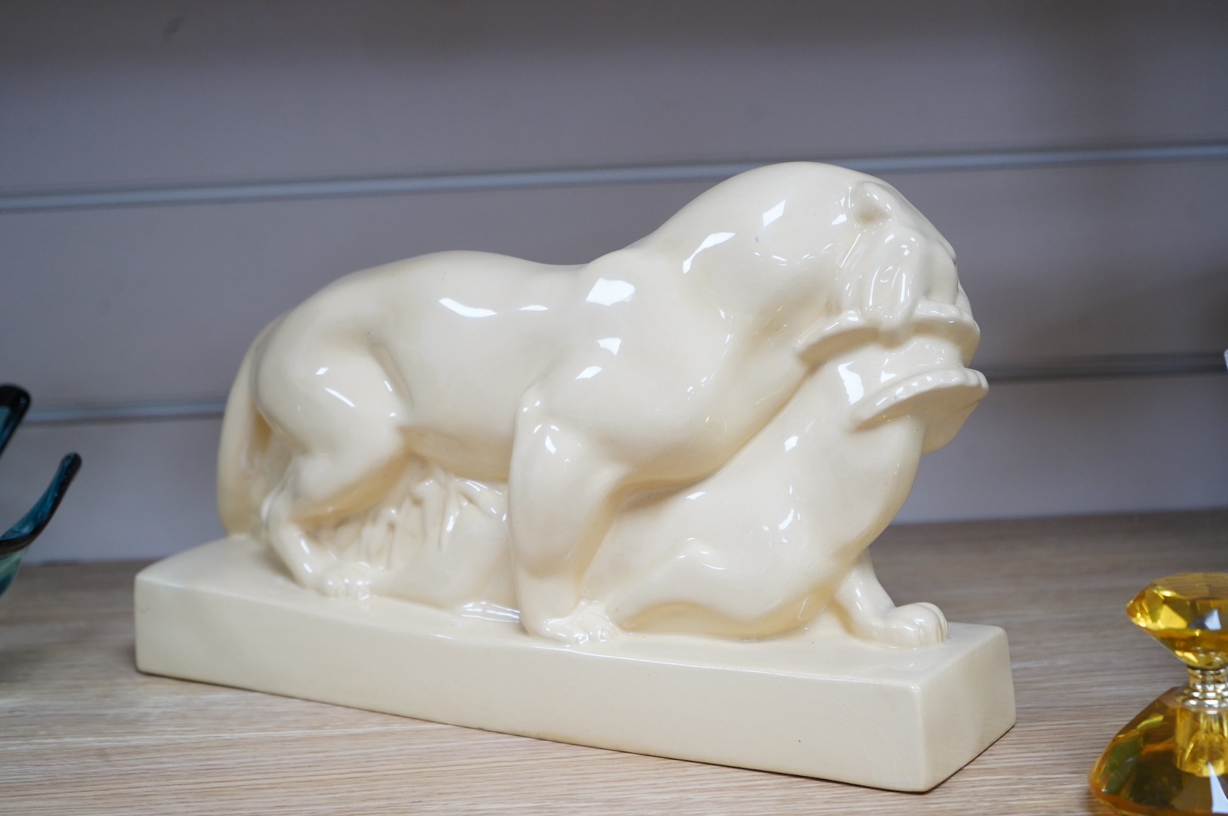 John Skeaping for Wedgwood, Art Deco sculpture of a Tiger with buck, straw glazed, 33cm wide